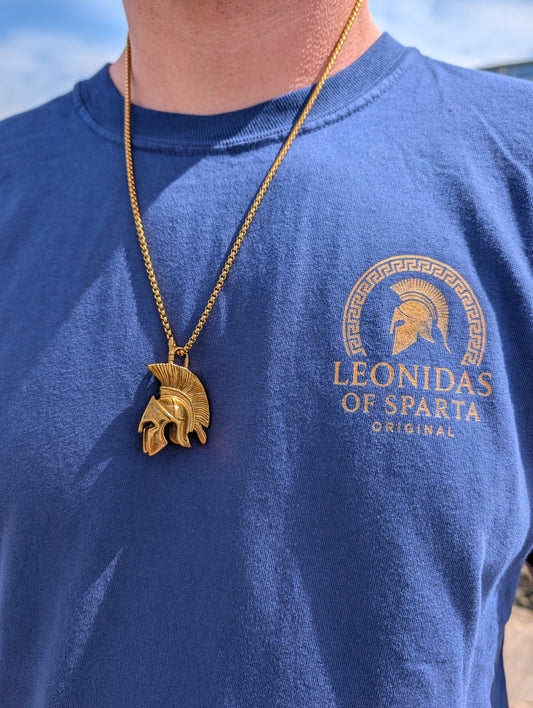 Gold Spartan Legacy Necklace worn with a blue Leonidas of Sparta T-shirt